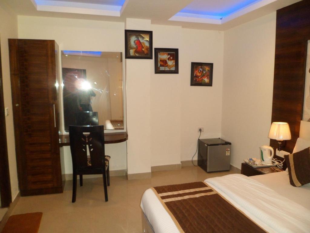 Hotel Arjun Neu-Delhi Zimmer foto
